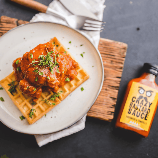 CRISPY CHICKEN AND WAFFLES WITH HABANERO AND TOMATILLO HOT SAUCE