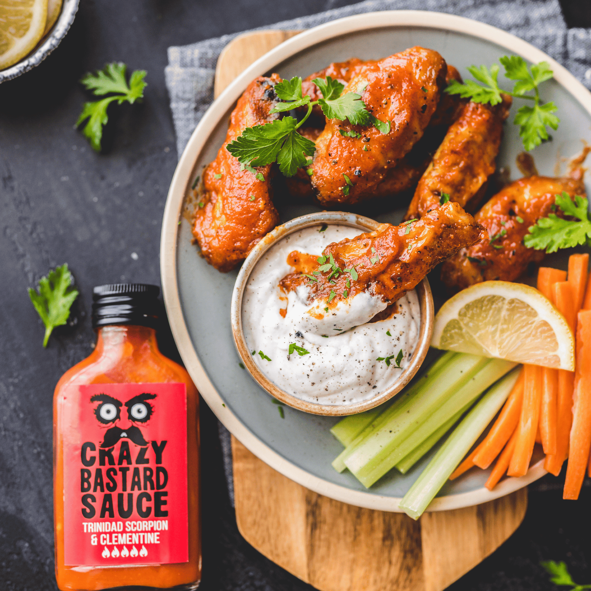 Wings with Trinidad Scorpion & Clementine Sauce | Crazy Bastard Sauce